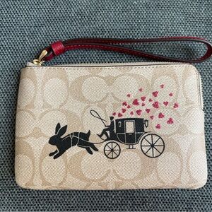 NWOT Coach logo wristlet with year of the rabbit detail
